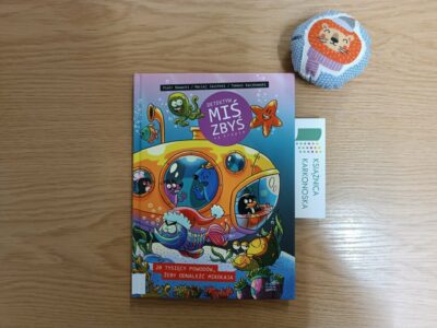 „20 tysięcy powodów, żeby odnaleźć Mikołaja” scenariusz: Maciej Jasiński, rysunki: Piotr Nowacki, kolory: Tomasz Kaczkowski (komiks 5+, 56 str., 2022)