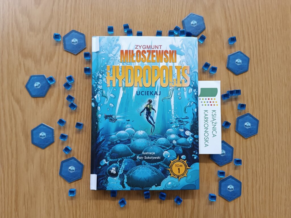 „Hydropolis: Uciekaj” tekst: Zygmunt Miłoszewski; ilustracje: Piotr Sokołowski (powieść fantastyczno-realistyczna 10+, 192 str., 2022)